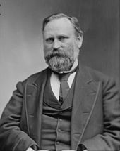 Black-and-white photograph of a bearded man