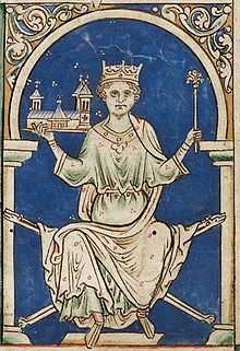 Enluminure d'un homme assis portant une couronne et tenant un sceptre et une église miniature