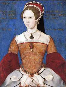 Portrait d'une jeune femme portant un corset et une coiffe