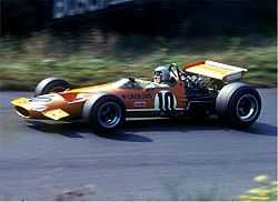 Bruce McLaren pilotant une de ses monoplaces au Grand Prix d'Allemagne 1969.