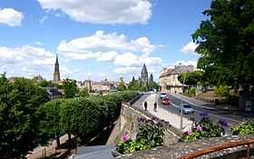 Vue sur la ville depuis le belvédère de l'Esplanade.De gauche à droite : la tour du temple de Garnison, la basilique Saint-Vincent et le temple Neuf