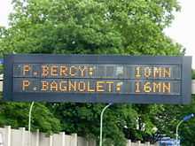 Panneau indiquant « P.BERCY: 10MN/P.BAGNOLET: 16MN »